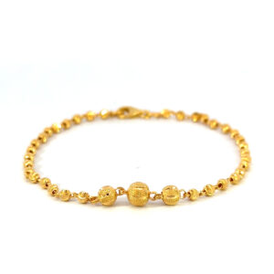 22k gold ball bracelet, 7" long.