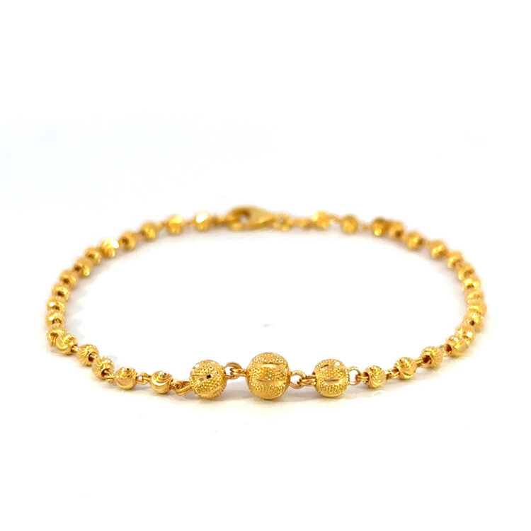 22k gold ball bracelet, 7" long.