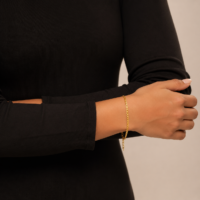 Lady wearing 22K Polished Gold Curb Chain Bracelet